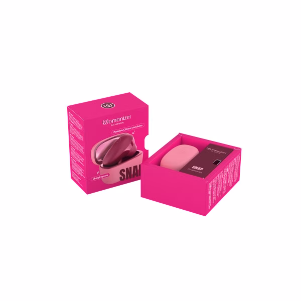 Womanizer Snap : stimulateur clitoridien et boîte de chargement