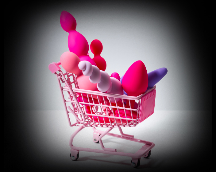 Woman and girl with colorful shopping bags